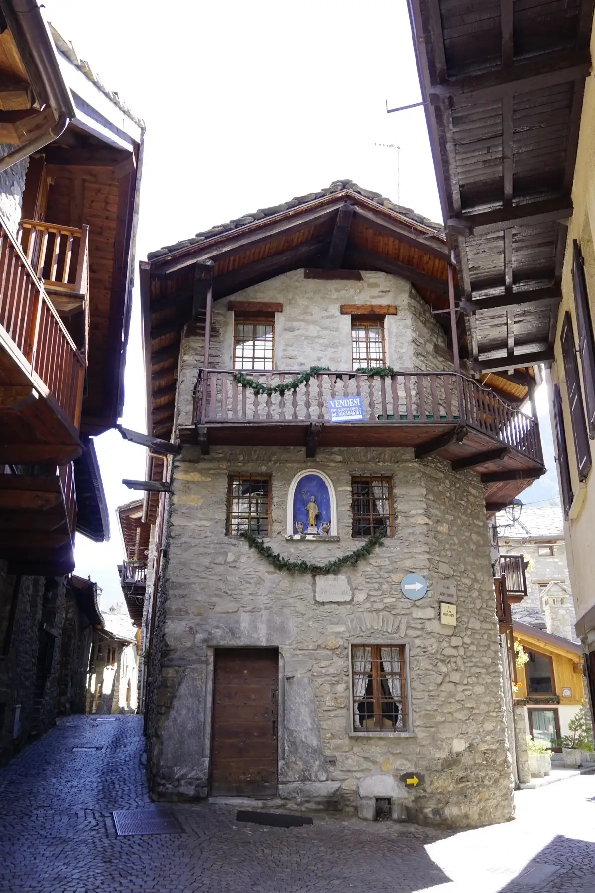 Narrow street of stone houses in Dolonne